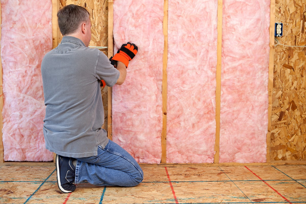 Man Installing Insulation